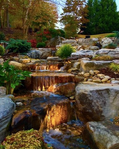 Natural rock garden water feature with cascading pools